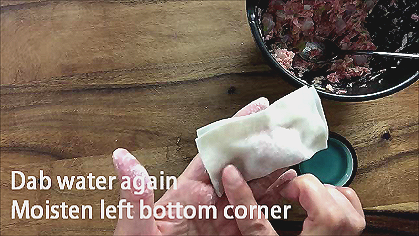 moisten left corner f
